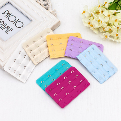 Three rows and four buttons stainless steel bra back buckle Three rows and four buttons bra extension buckle Unpackaged bra extension buckle