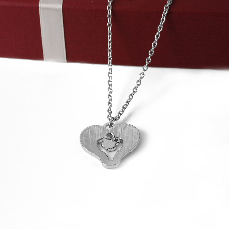 Mode Créative Mode Amour Ailes Aile Vide Chien Patte Pendentif Collier Nihaojewelry Gros display picture 7