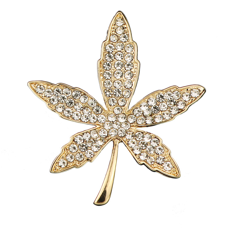 Gold with crystal diamonds maple leaf broach, wear it with any clothing and sparkle everywhere you go