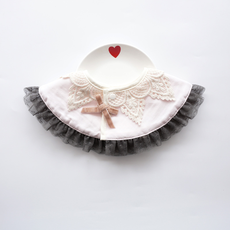 Light pink bow with black border