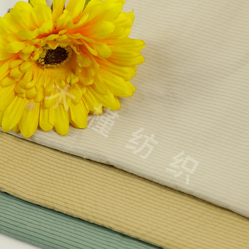 木槿纺织 新款竖条羽绒服 棉服面料