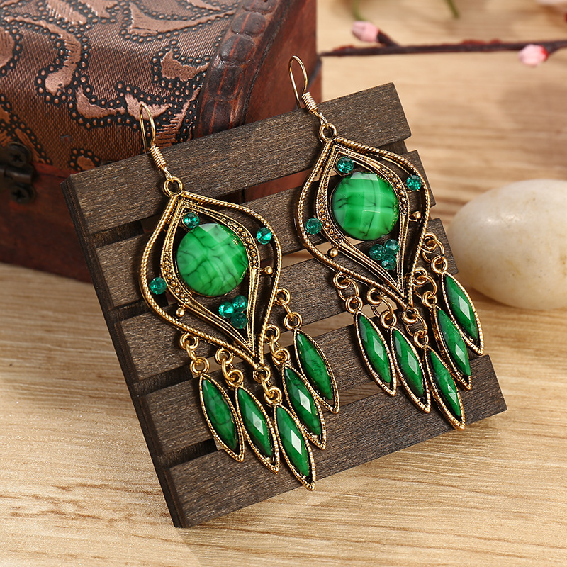 Creative Exaggerated Hollow Water Drop Tassel Ethnic Style Diamond Earrings display picture 4