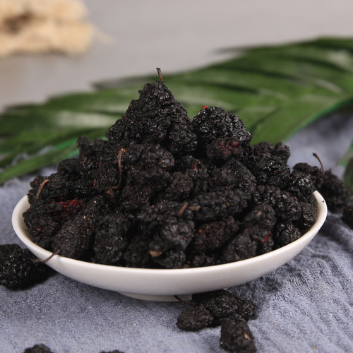 Wholesale black mulberry for medicinal and edible purposes, sourced from Sichuan with water washing, plump berries in large quantity, offering premium quality.