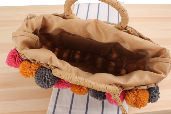 New Cute Color Hair Ball Hollow Hand-carried Straw Woven Bag 32*28*7cm display picture 5