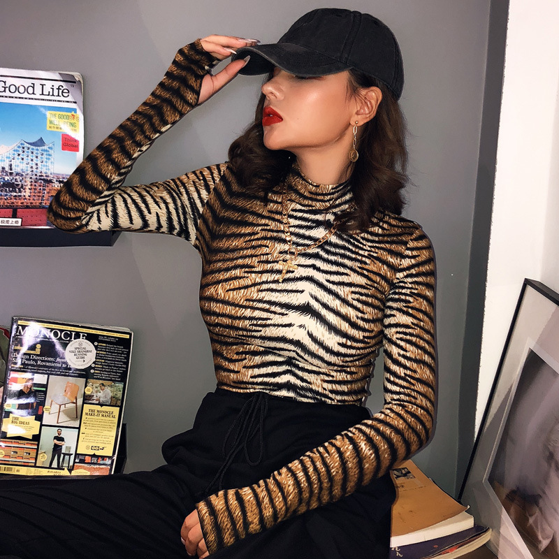 nihaostyle clothing wholesale new striped high-neck long-sleeved jumpsuit NSHTL67349