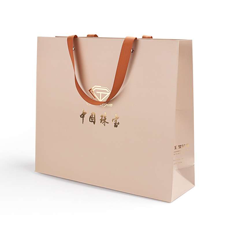 白卡手提袋礼品袋打铆钉外贸牛皮纸袋服装手拎袋珠宝包装纸袋子