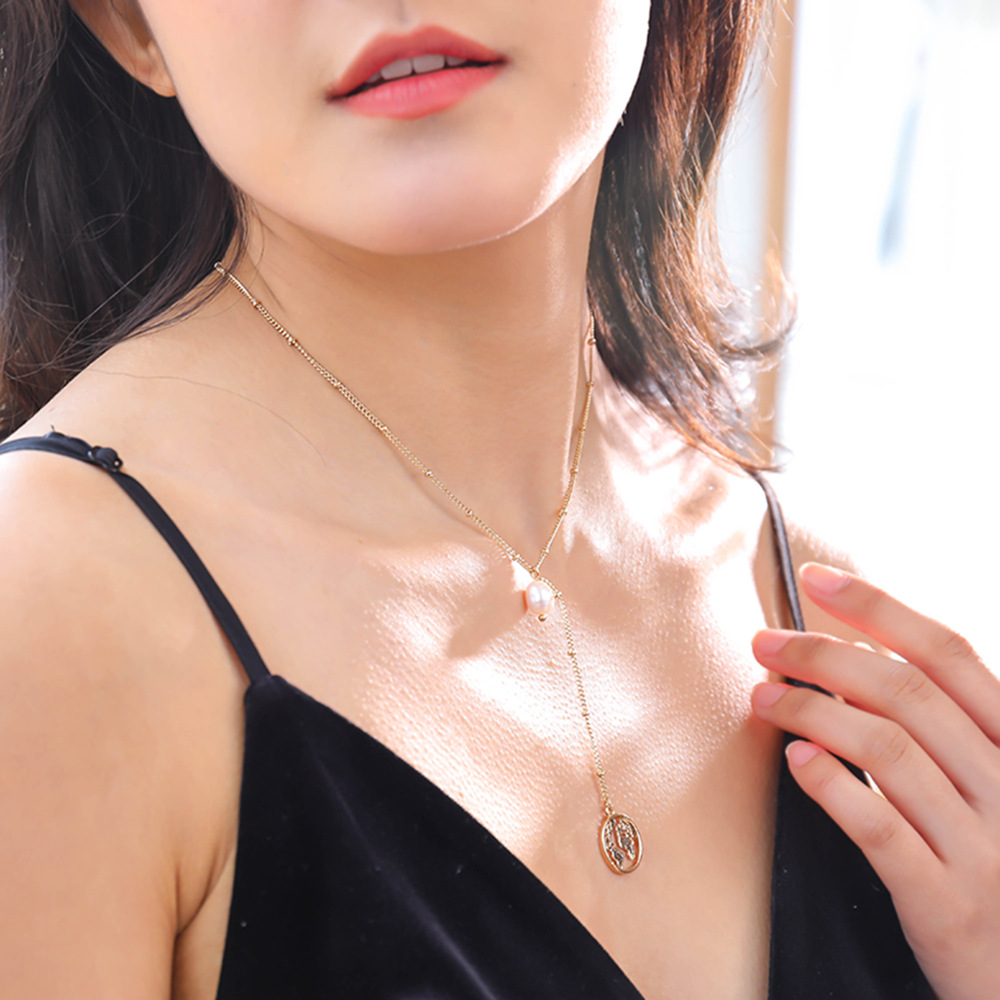 Collier Simple Avec Pendentif Carte Du Monde En Perles D&#39;eau Douce Multicouches display picture 12