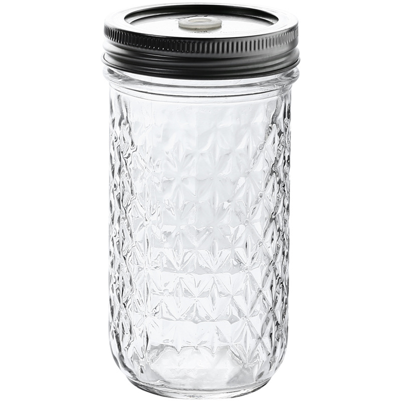 Clear glass mason jar with lid