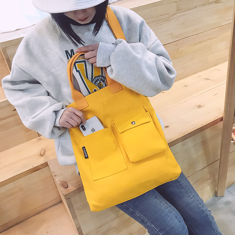 Bolsa de mensajero de las mujeres nuevo estilo coreano versátil artístico simple estudiante de gran capacidad de hombro Portátil Bolsa de lona al por mayor image 4