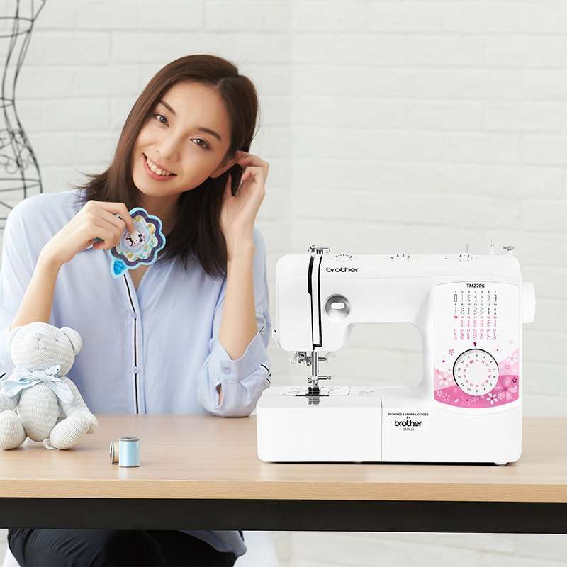 兄弟缝纫机TM27PK电动家用吃厚衣车台式多功能带锁边阿里巴巴