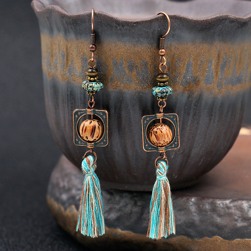 Retro Leaf Pendant Earrings Hollow Out Carved Alloy Tassel Earrings