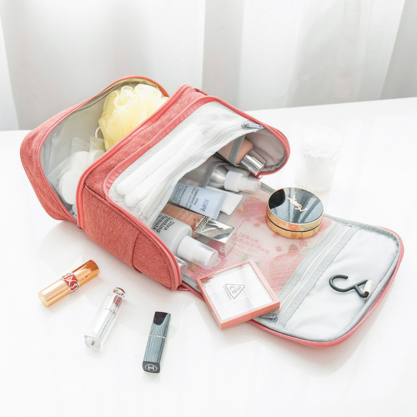 Capacious handheld cosmetic bag for traveling wet and dry separation