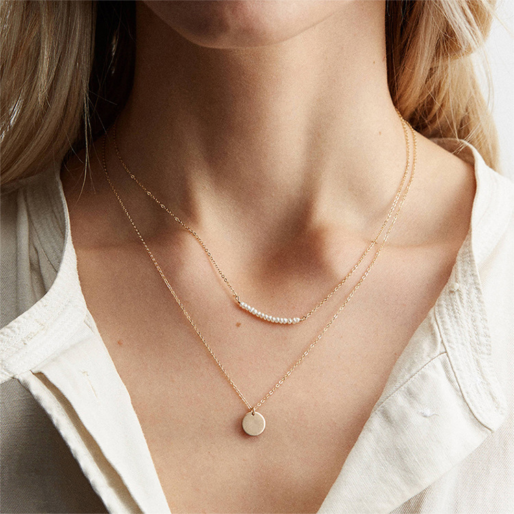 Emanco Europe Et En Amérique Croix Frontière Ornement Simple Double-couche Perle Collier En Acier Inoxydable Collier Or-plaqué Clavicule Collier En Gros display picture 1