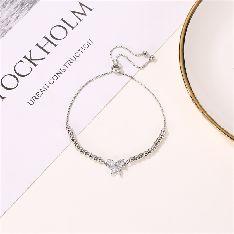 Korean New Fashion Literary Sweet Beaded Adjustable Micro-set Zircon Bow Bracelet display picture 5