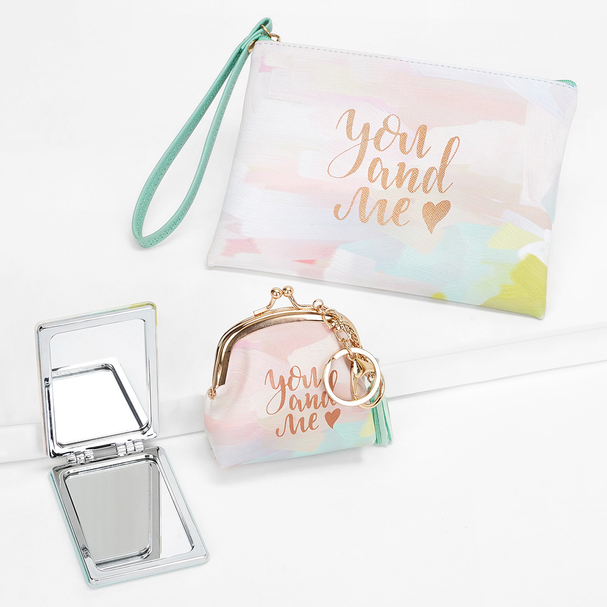 Traje de regalo de lujo ligero espejo cosmético teléfono móvil bolsa monedero regalo de tres piezas conjunto anual reunión regalo traje de negocios