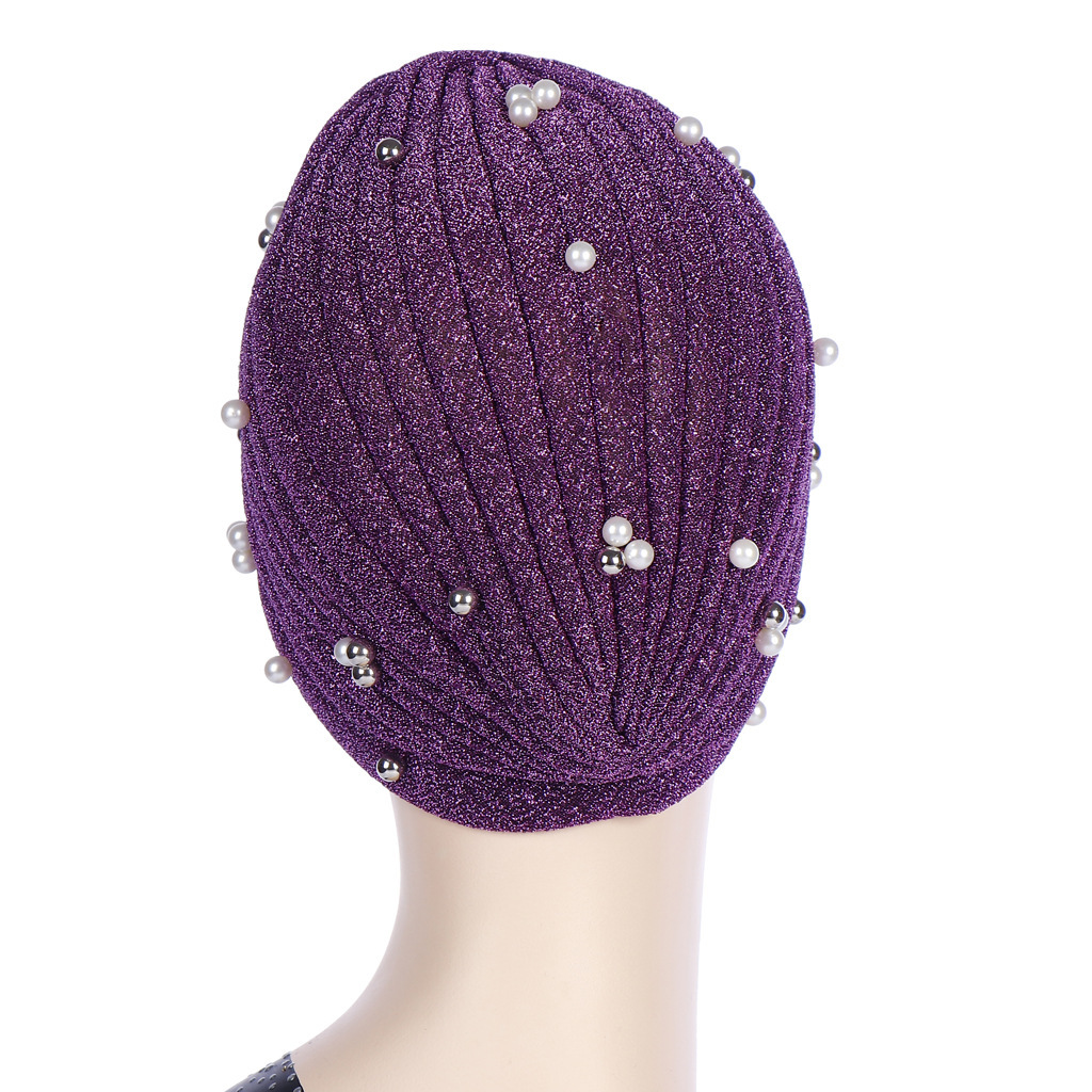 Muslim head cap in purple