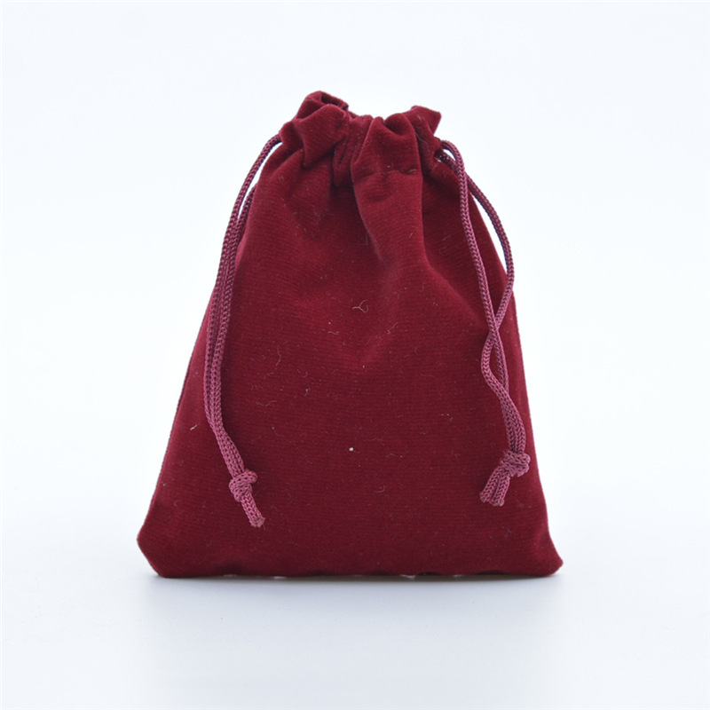 Fabricante en stock negro franela cordón bolsa cordón joyería embalaje bolsa paja auricular bolsa de franela