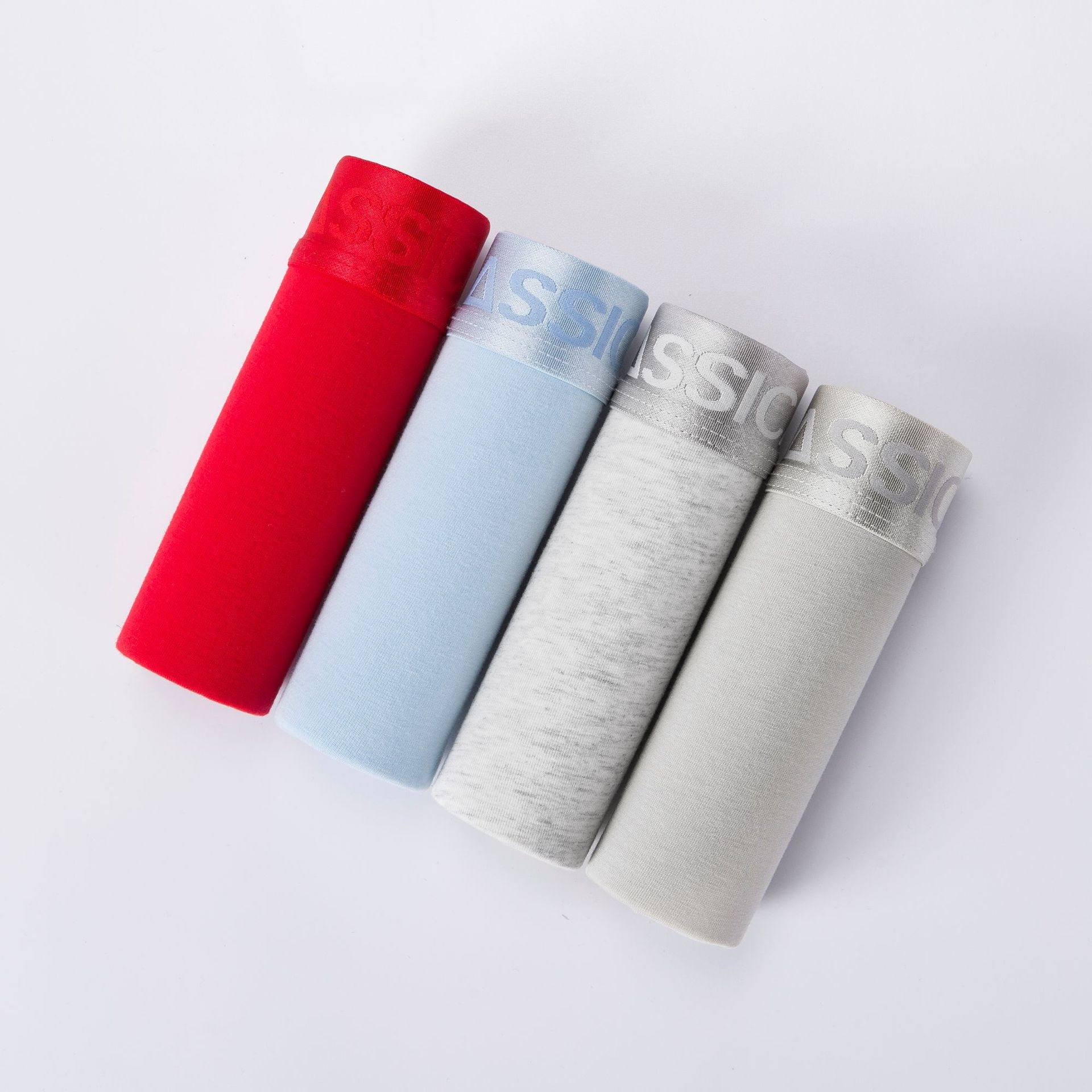 Fabricantes de ropa interior para hombres populares de color sólido ropa interior de algodón boxers en caja pantalones cortos calzoncillos de cabeza boxeadores al por mayor transfronterizos