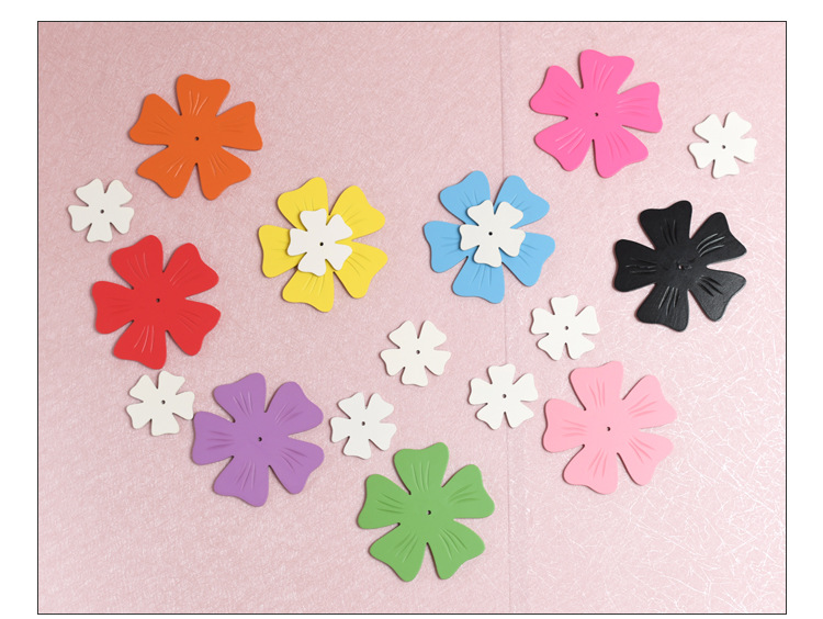 The room decoration is simple and three-dimensional, with plum blossom wall stickers, children's clothing store, kindergarten wall color small decorations, and wooden handicrafts detail image 10