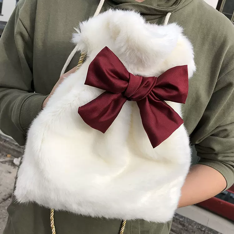 秋冬仿獭兔毛毛绒毛毛包包女韩版束口蝴蝶结斜挎单肩小包水桶包