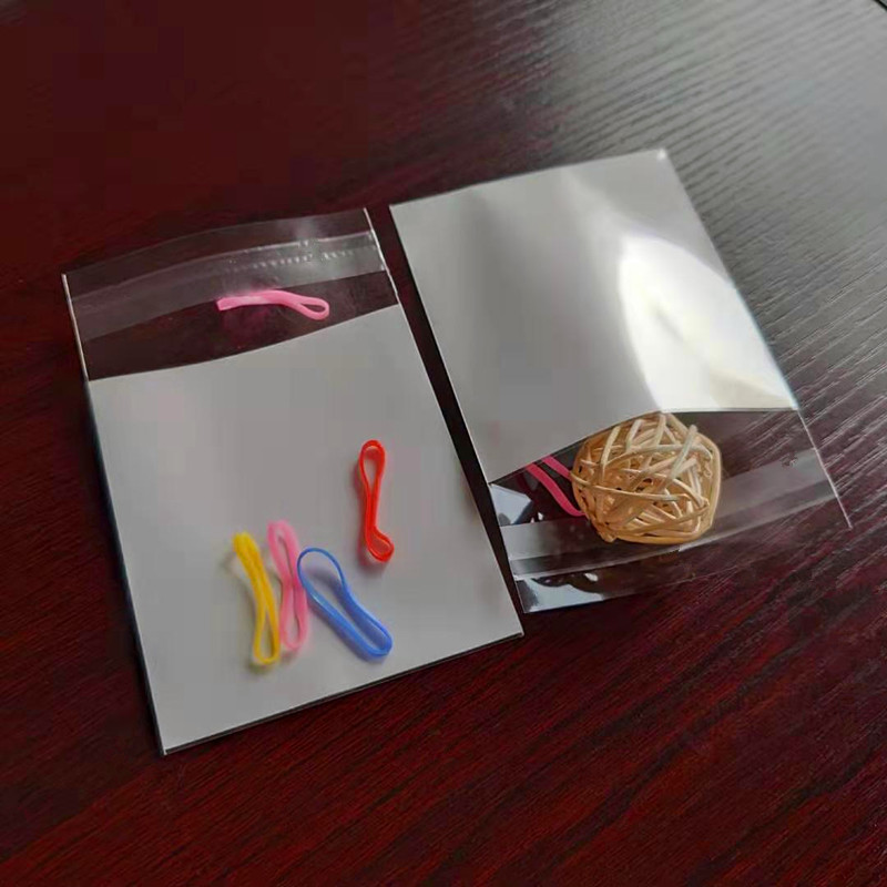 工厂做opp白底珠光膜三层自粘袋 数据线包装袋小饰品卡头挂孔袋