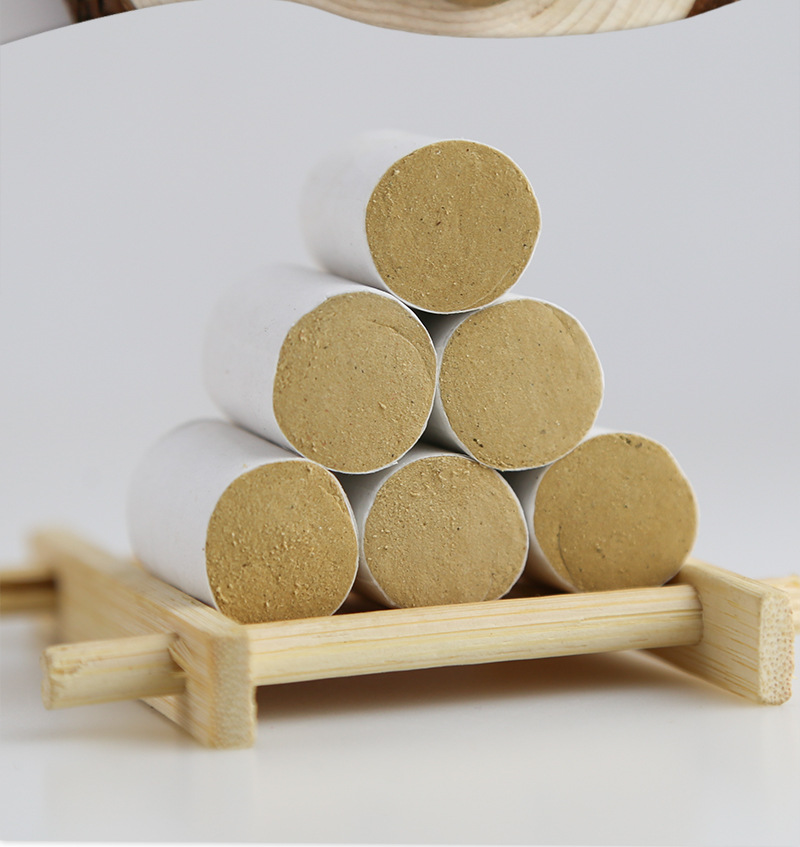 Wu Yuan Su Golden Moxa Cones Ai Zhu 49 Count Box Pure Moxibustion Sticks for Home Warm Therapy in use