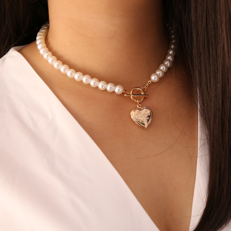 Retro Open Heart Shape Pearl Necklace display picture 15