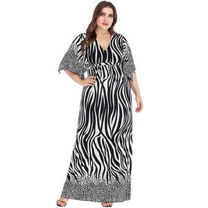 The manufacturer directly provides new European and American large V-neck striped bat sleeve bandage splicing dress and 