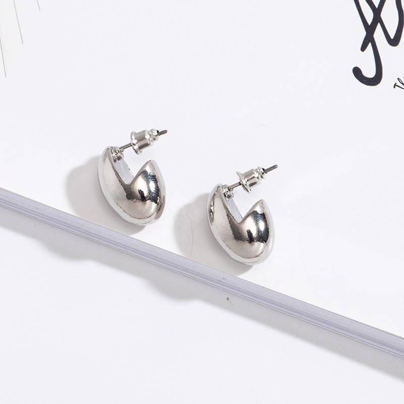 Korea Simple Texture Curved Water Drop Metal Wild Short Earrings For Women display picture 7