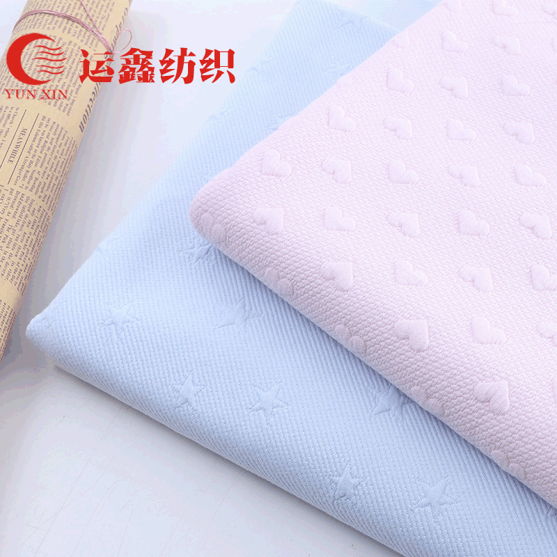 厂家供应新款素色染色幸运花全棉提花空气层服装家纺面料现货批发