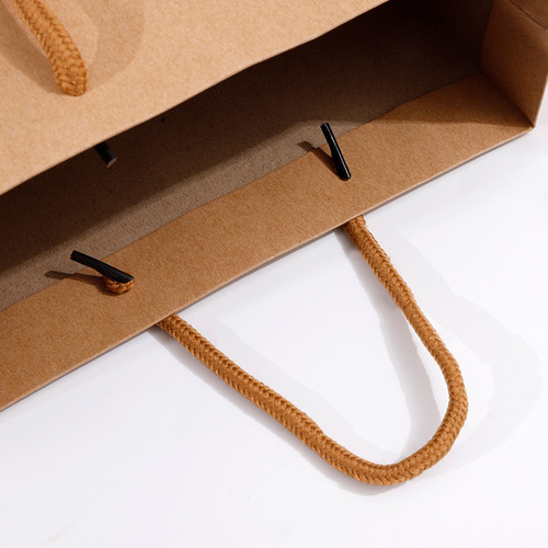 Wholesale vintage kraft paper handbags, gift bags, shopping clothing paper bags, packaging bags, large quantity discount