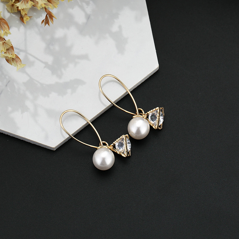 Korean version creative hollow winding ball earrings simple geometric zircon pearl earrings factory wholesale