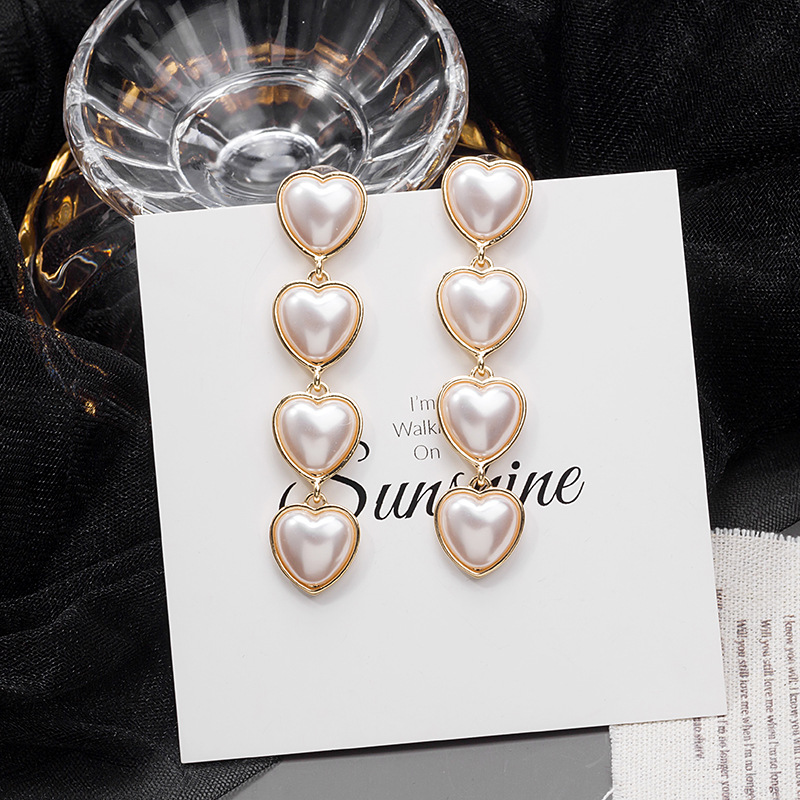 Fashion Long Heart Shaped Full Pearl Alloy Drop Earrings Wholesale display picture 3