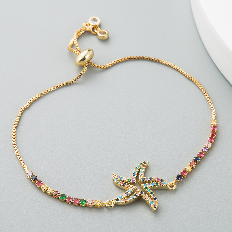 Female Copper Adjustable Creative Hollow Starfish Rainbow Inlaid Zircon Bracelet display picture 3