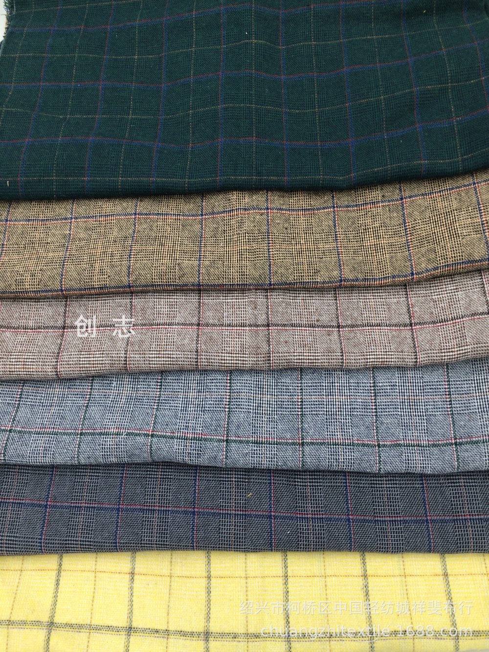 南通磨毛色织格子英伦风女装衬衫面料拉毛格纹淘现货织布厂先染布