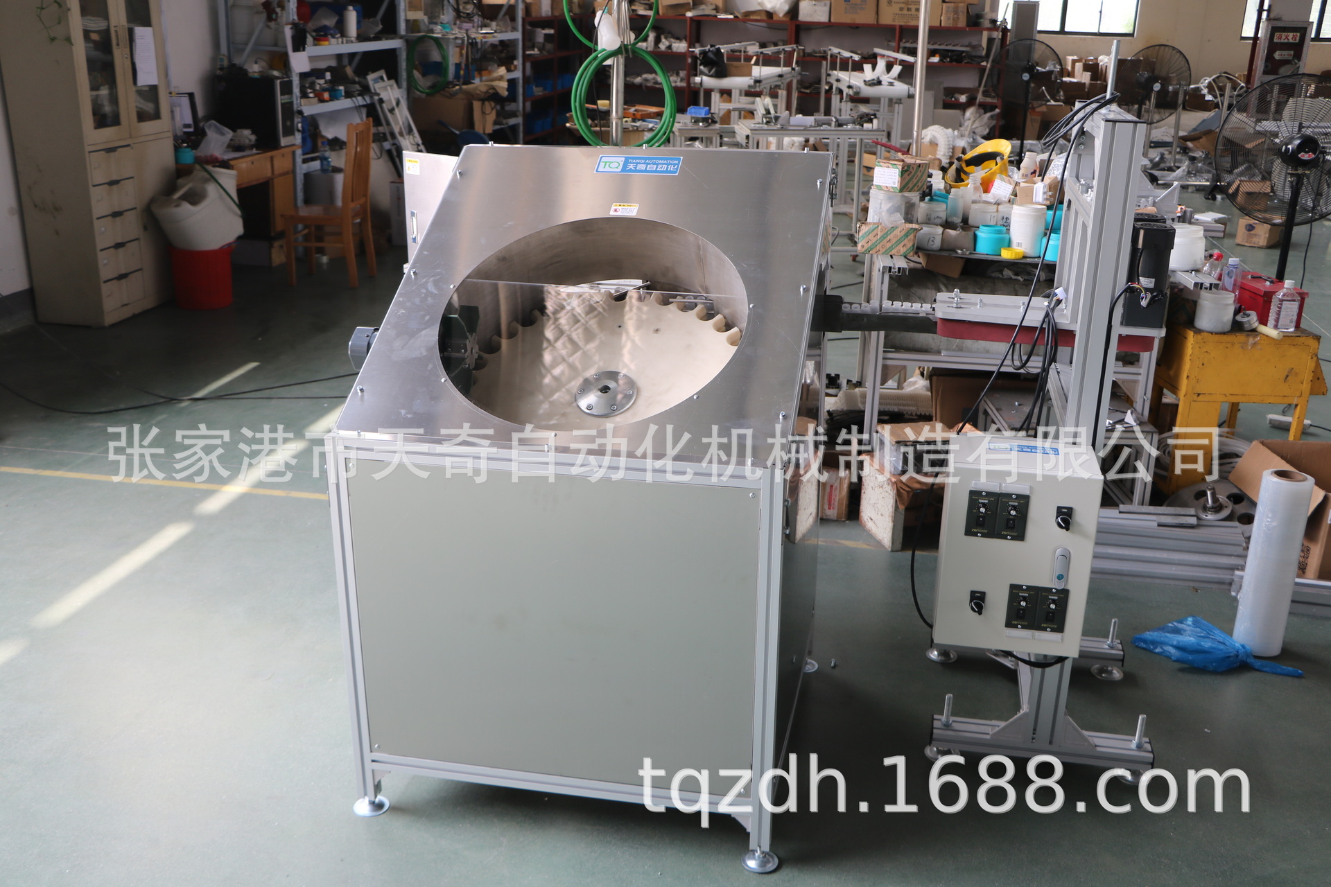 天奇公司专业生产各类塑料圆瓶自动理瓶机