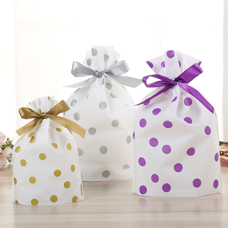 淘宝可爱波点束口袋 糖果饼干抽绳袋食品烘焙袋 礼品塑料袋批发