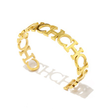 异国情调饰品 CHC字母连排镂空C型开口可调节手镯女铜镀金18K饰品