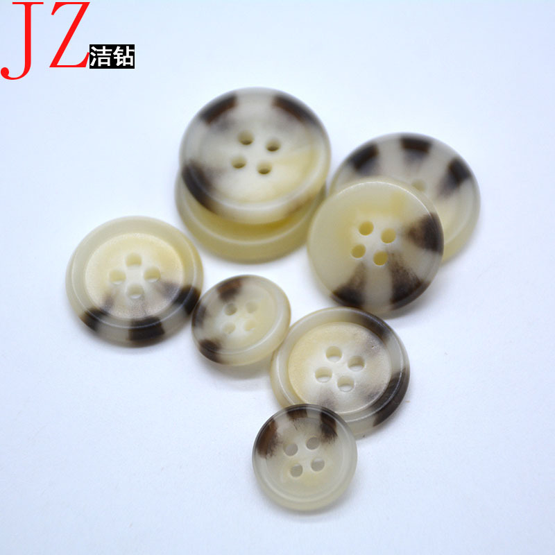 现货四眼圆形树脂纽扣 三点花纹大衣扣子 狗爪棒花大衣风衣外套扣