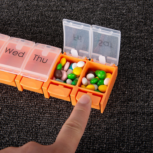 Pressurized bouncing medicine classification portable mini travel medicine organizer, 7-day travel medicine storage box