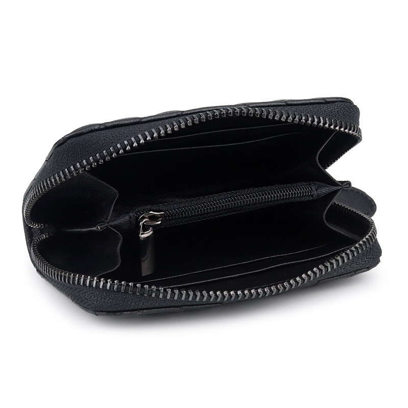 Bolsa de cambio de piel de oveja suave, bolsa de cuero bordada de moda, nueva bolsa de monedas transfronterizas, una bolsa de venta