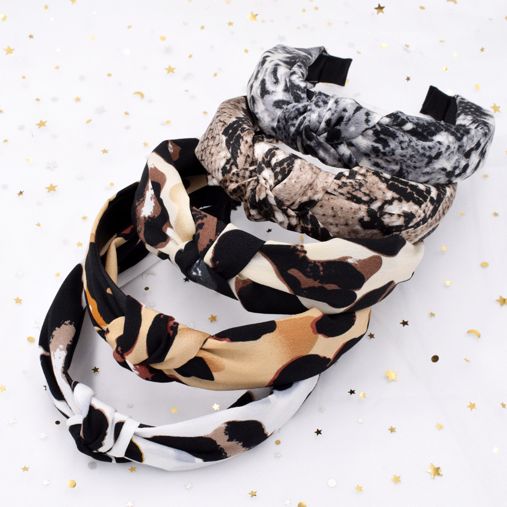 Leopard Print Snakeskin Fabric Cross-knotted Retro Broad-brimmed Headband Wholesale display picture 1