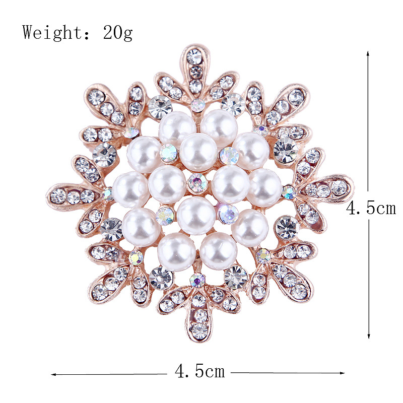 Spilla girasole con perle e strass oro rosa per donna_voghion.com