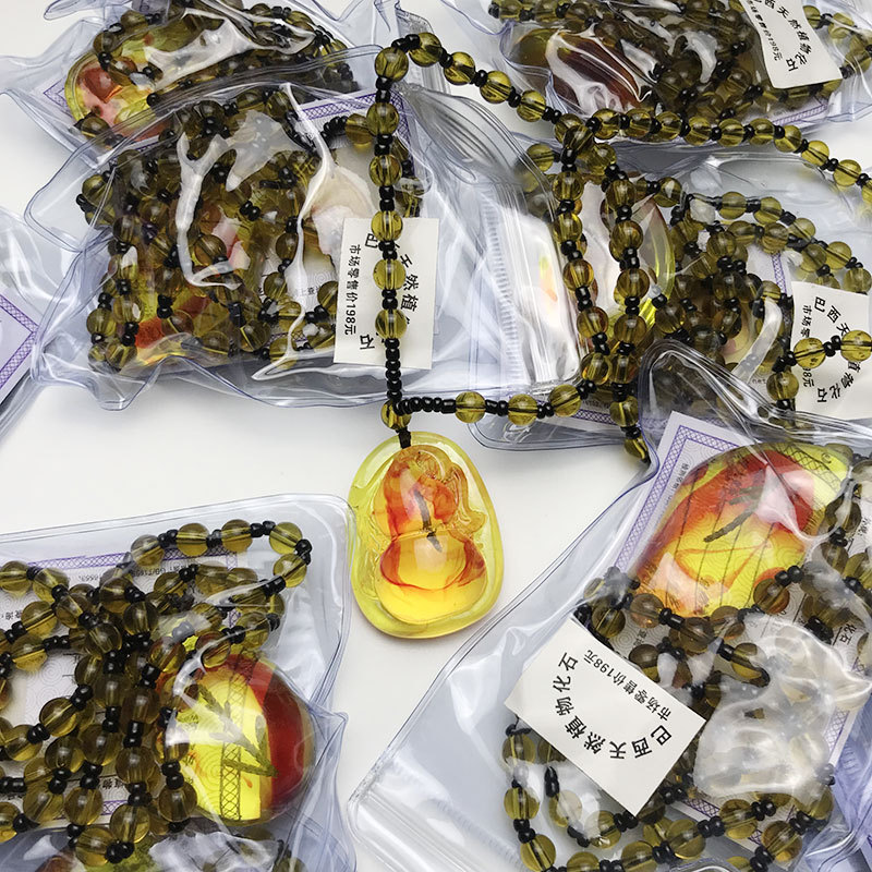 景区热卖巴西植物化石昆虫血丝琥珀吊坠会销倒插礼品货源批发|ru