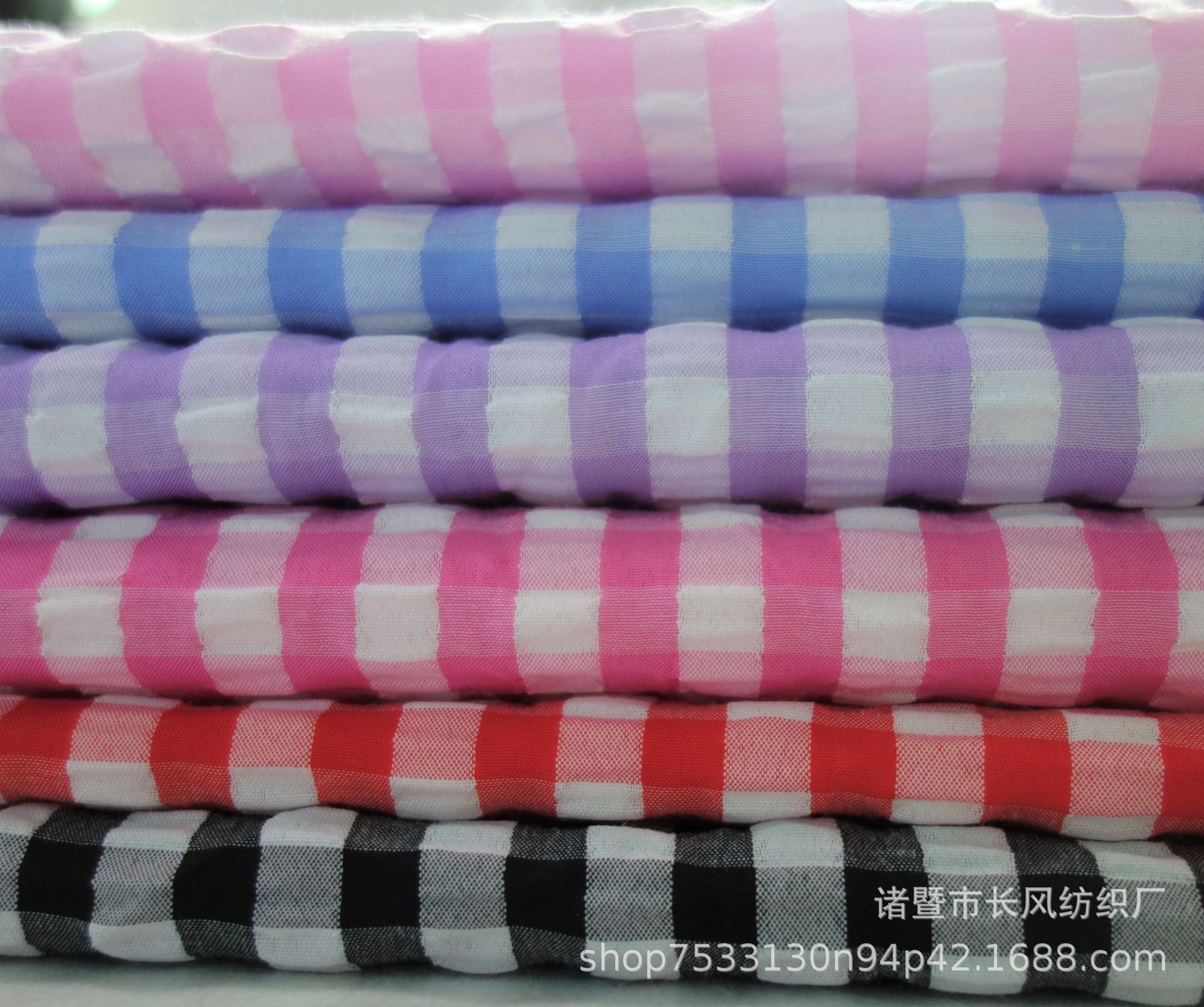 现货供应泡泡纱朝阳格子布 女士连衣裙 时尚女童装面料防晒衣面料