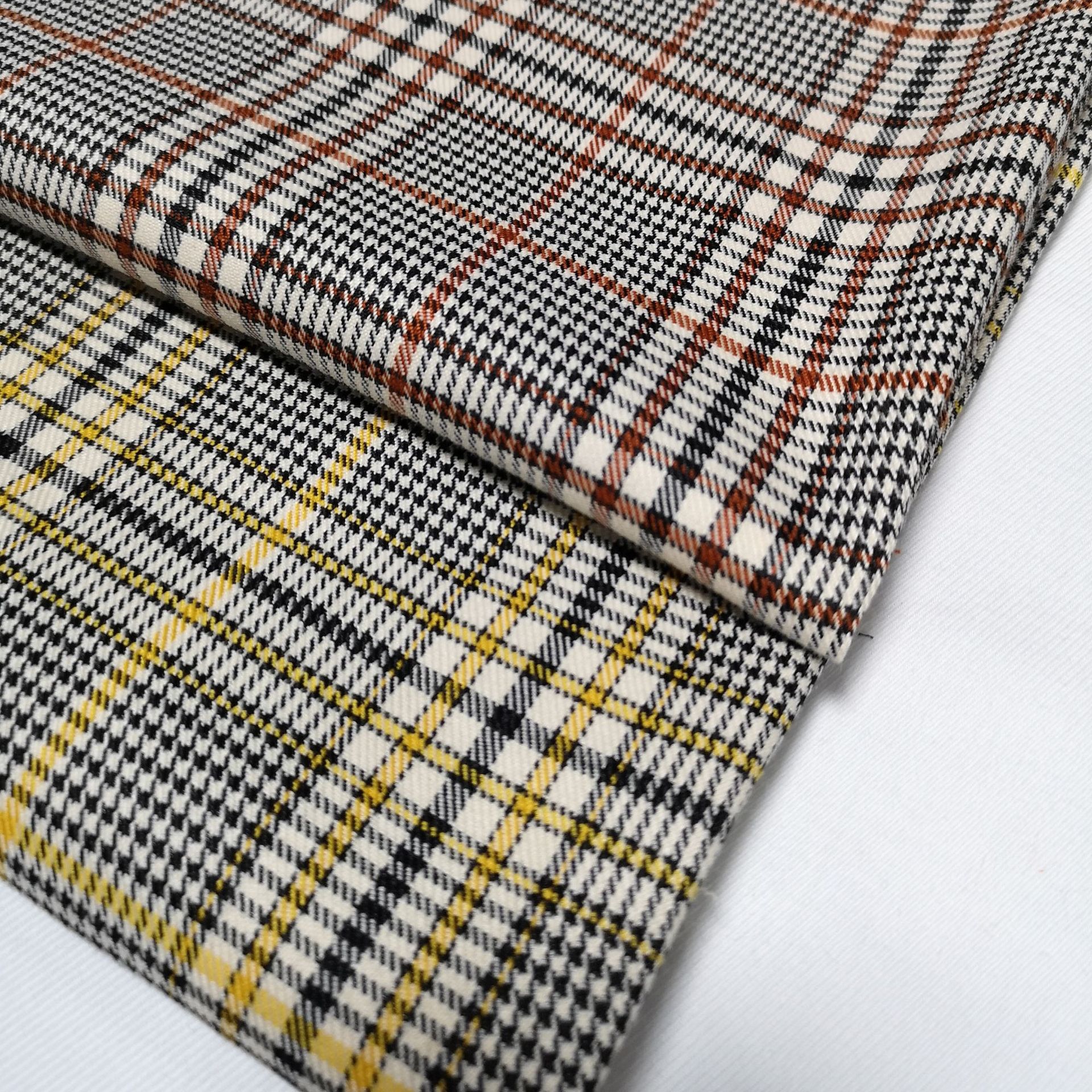 TR弹力色织彩色千鸟格面料韩版时装涤纶裤料床上用品箱包布料现货