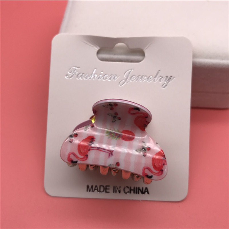 Paquete de tarjetas tamaño pequeño 4cm de acrílico de cuatro garras horquilla clip de agarre del pelo dos yuanes tienda de accesorios para el cabello accesorios para la cabeza de suministro