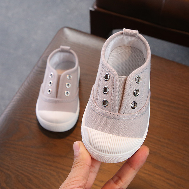 Giày trẻ em 2019 mùa xuân mới cho trẻ em giày vải bé trai và bé gái một bàn đạp mẫu giáo trong nhà giày thông thường Giày vải trẻ em