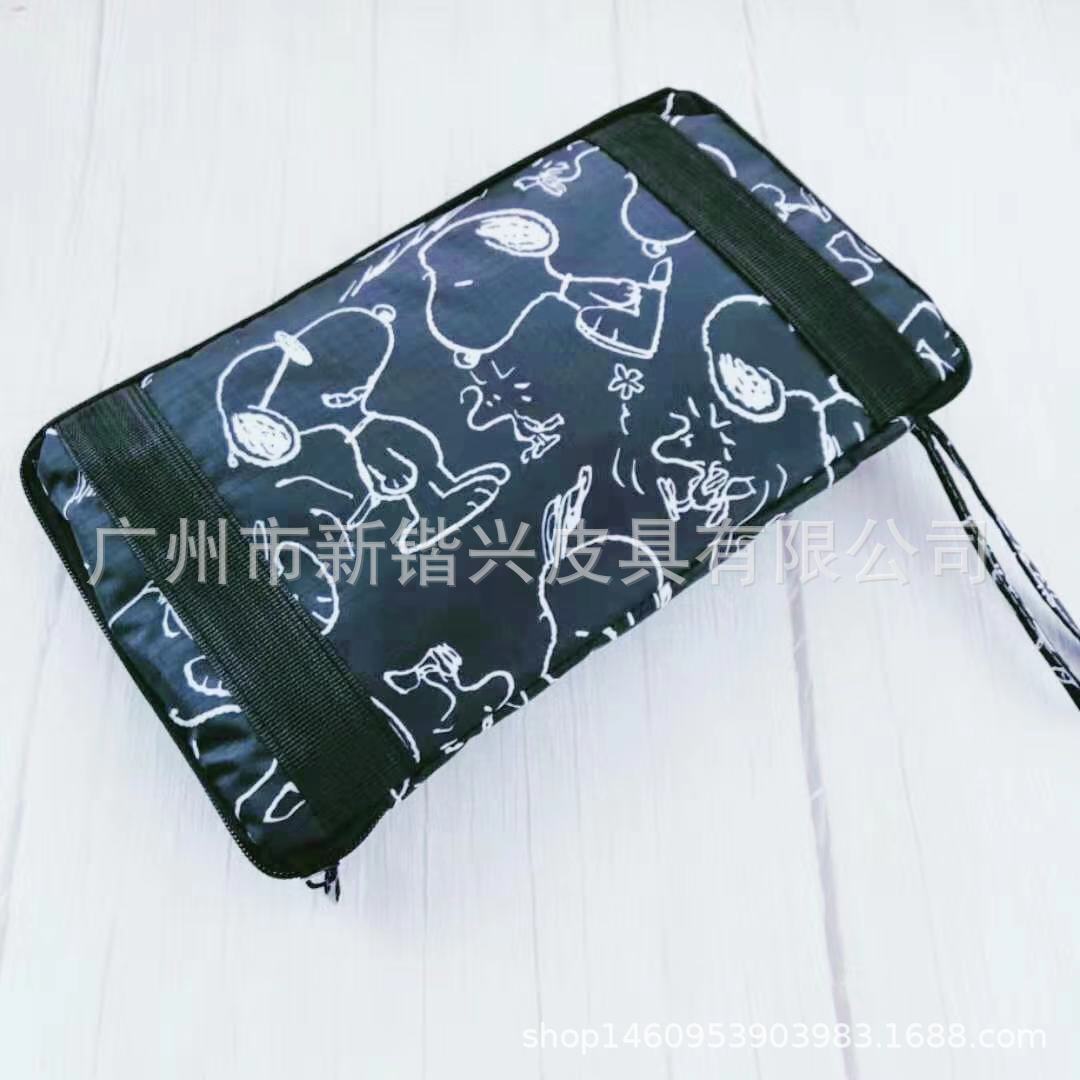 布丁犬玉桂犬美楽蒂k.t防水アニメ携帯折りたたみ旅行バッグはスーツケースに固定できます。