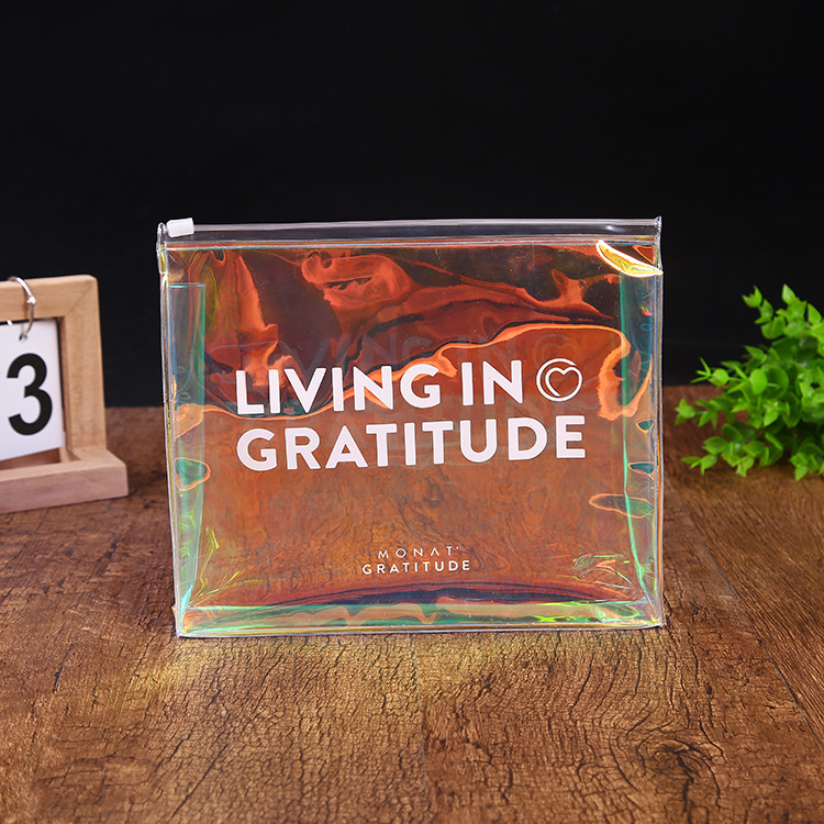 工厂定 做幻彩pvc镭射拉链袋广告活动礼品袋化妆品包装袋定 制